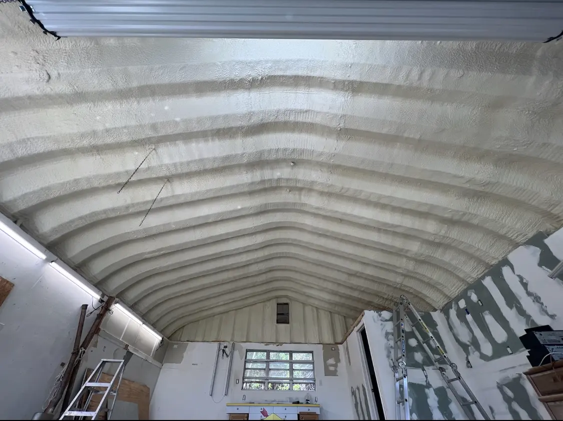 Spray polyurethane foam applied to the underside of a metal roof deck in Fairwood
